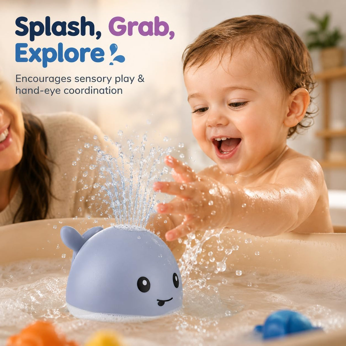 Whale fountain bath toy spraying water as a child reaches toward it