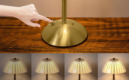 Cordless diamond table lamp with touch control; four light settings shown