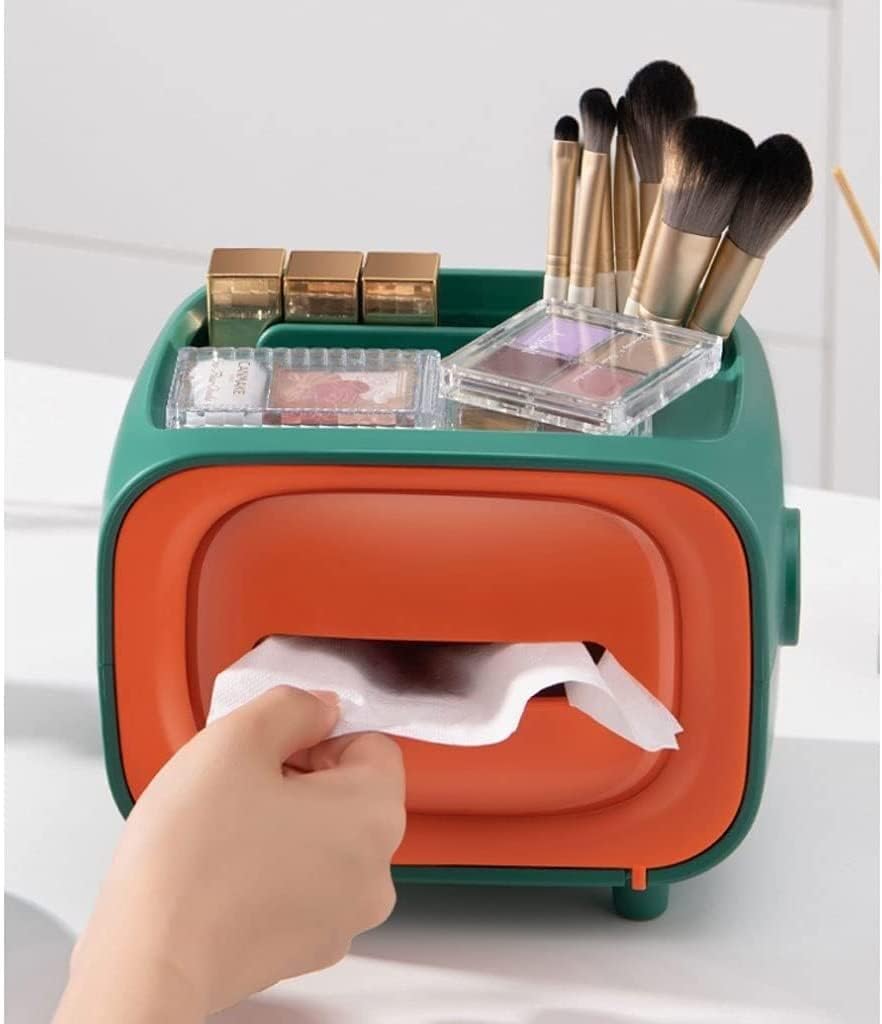 Retro TV tissue box with a top storage tray holding makeup and brushes.