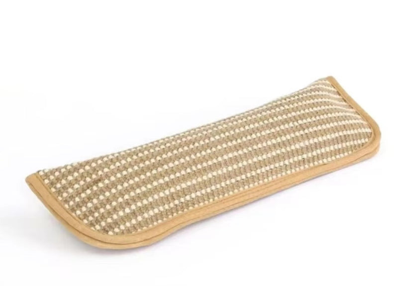 Rectangular cat chew mat with woven sisal mesh and tan edging