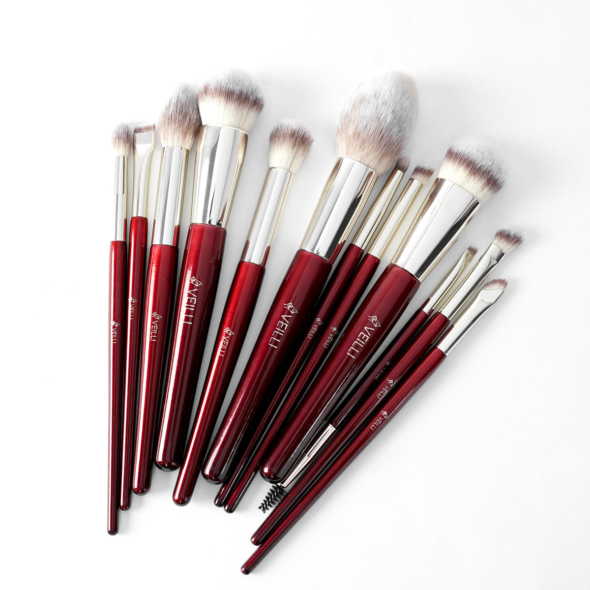 Twelve burgundy-handled makeup brushes with assorted fluffy and detail heads