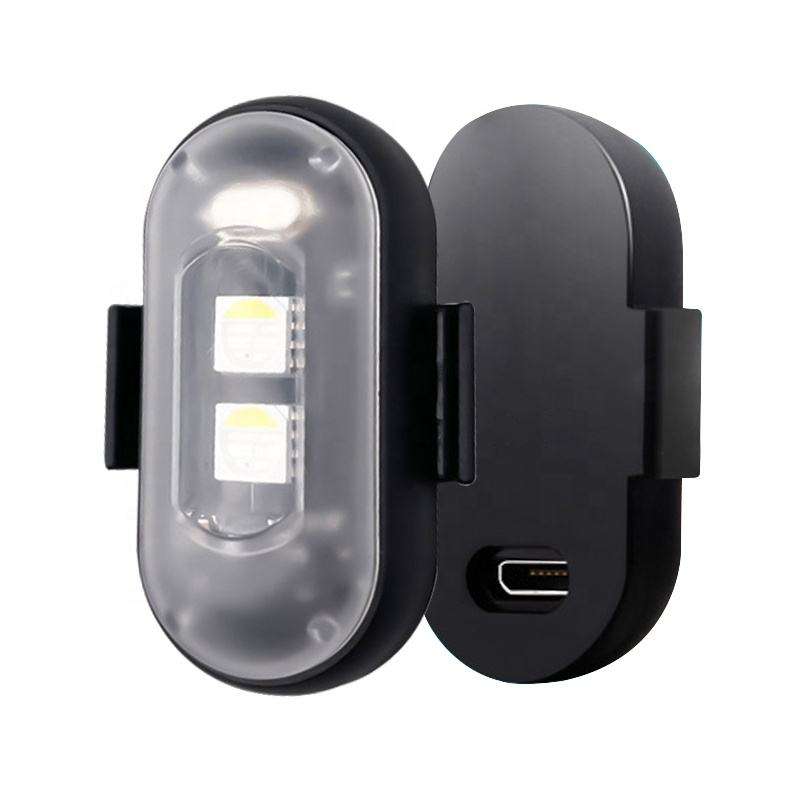 Wireless LED strobe light with two LEDs, a clear cover, mounting clips, and a charging port