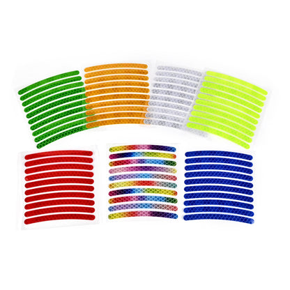 Assorted reflective tire sticker strips in green, orange, white, yellow, red, blue, and multicolor.