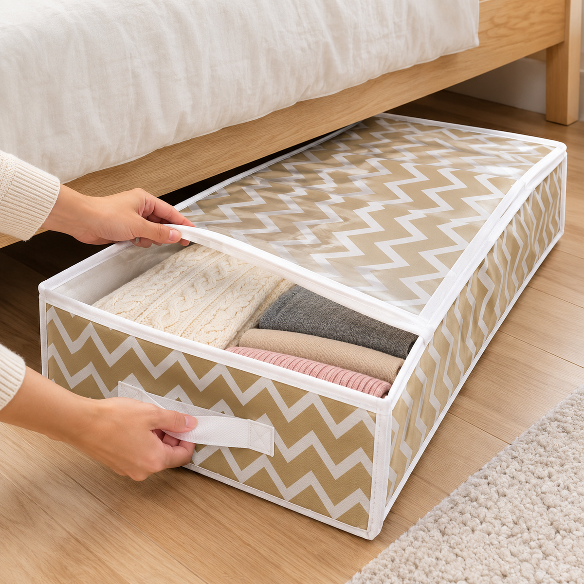 Zippered fabric drawer organizer with tan chevron pattern shown under a bed