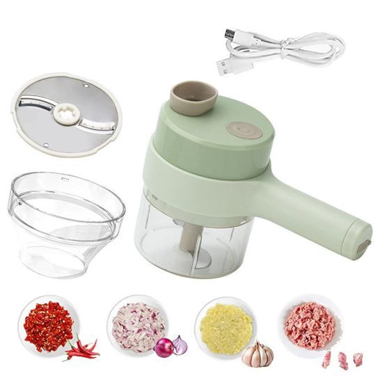 Green mini food chopper with transparent container, extra bowl parts, and USB charging cable