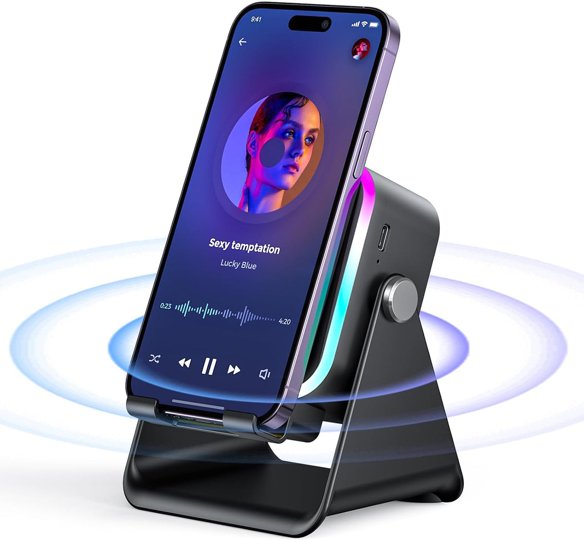 Wireless speaker stand with dark body and multicolor light ring, phone on top