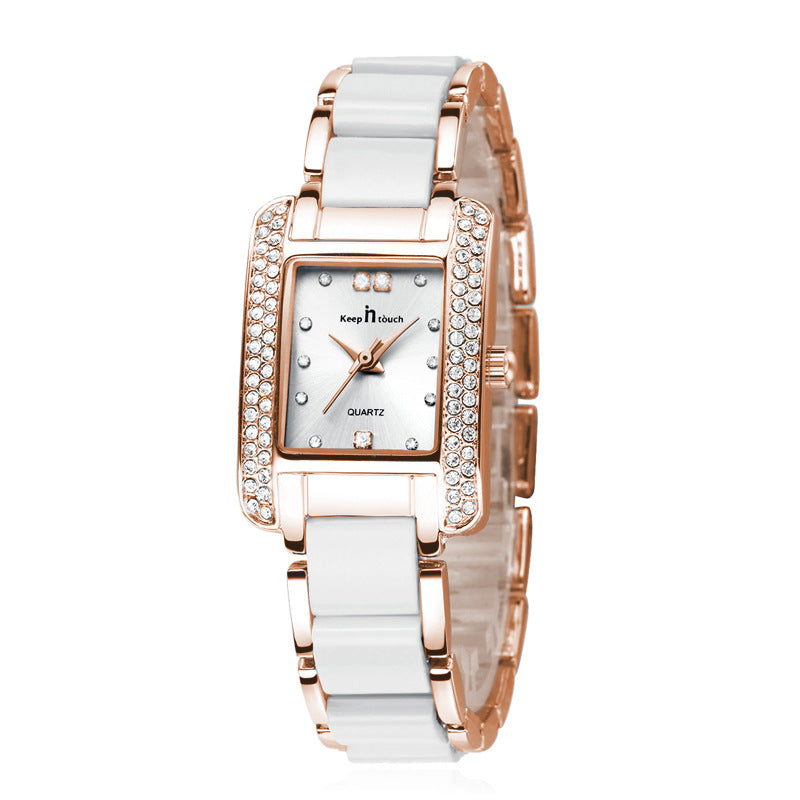 Rose gold square quartz watch with rhinestone border and white ceramic band