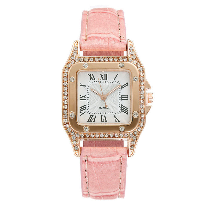 Close-up of women’s square quartz watch showing rhinestone details
