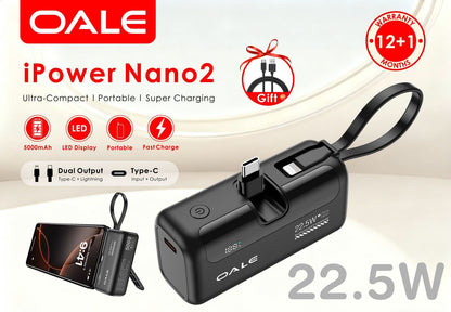OALE iPower Nano2 power bank with built-in cables, digital display and carry loop beside a phone