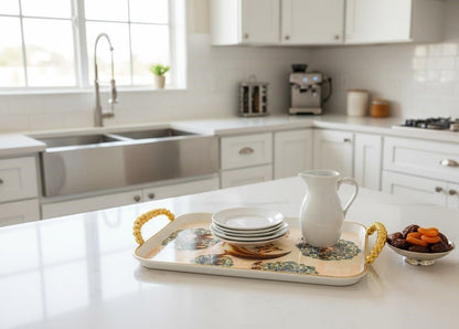 Ramadan Kareem decorative tray with crescent moon design and gold handles, holding dishes