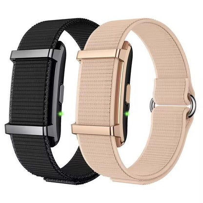 Smart fitness tracker bracelets in black and beige with woven bands and metal clasps