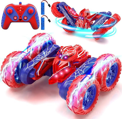 Remote control spider stunt car with red and blue body, four oversized wheels, controller and batteries