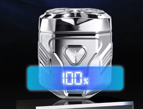 Silver GEC electric shaver with twin rotary heads and illuminated 100% battery display