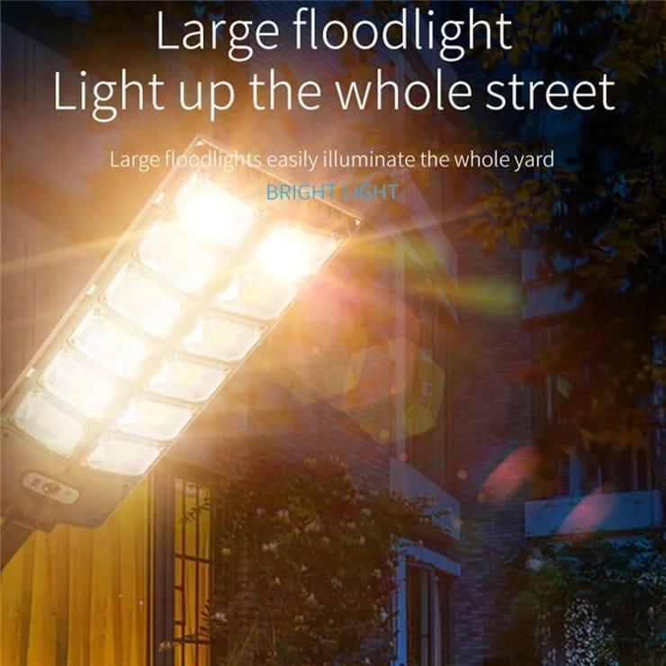 Solar sensor outdoor light with illuminated LED panels for broad outdoor coverage.