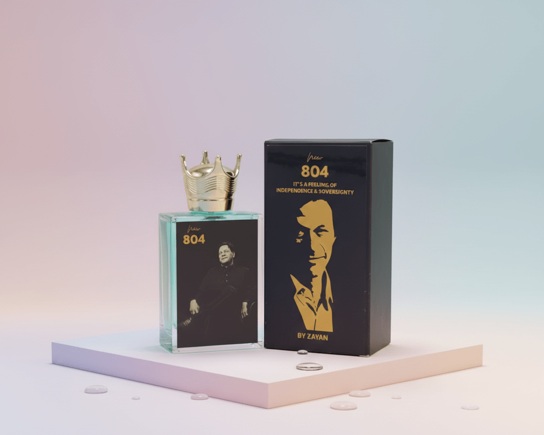 804 Imran perfume set with a green glass bottle, crown-shaped cap, and black box.