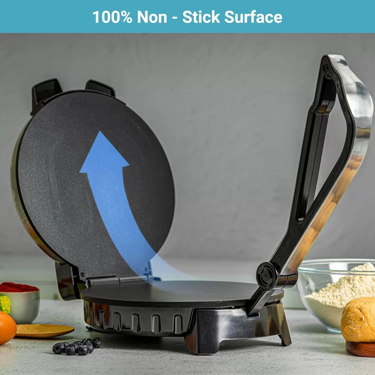 Open electric roti maker with raised nonstick plate and stainless steel handle