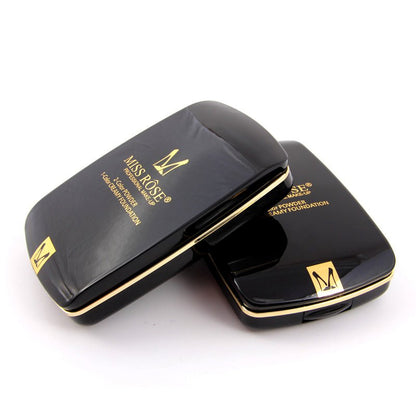 Miss Rose compact powder in two closed black cases with gold trim