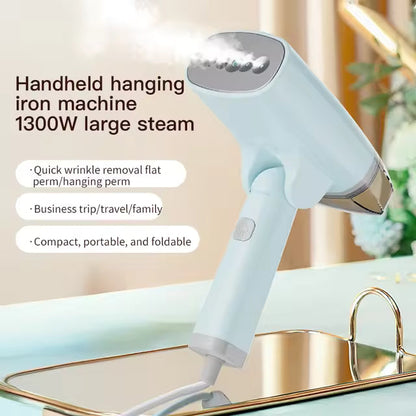 White handheld garment steamer with a folding handle and four steam vents