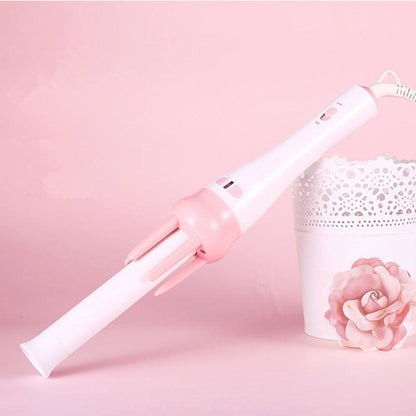 White and pink handheld hair curler with rotating barrel and cord