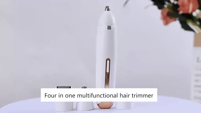 White 4-in-1 hair trimmer with a slim body and metallic detail