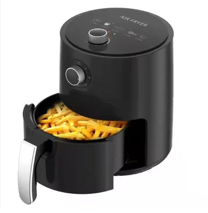 Black digital air fryer with open basket filled with fries and two control dials.