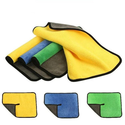 Double-sided microfiber cloths in yellow, blue, green, and gray with black edging
