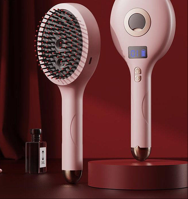 Pink electric massage spray comb with bristles, mist outlet, and digital display