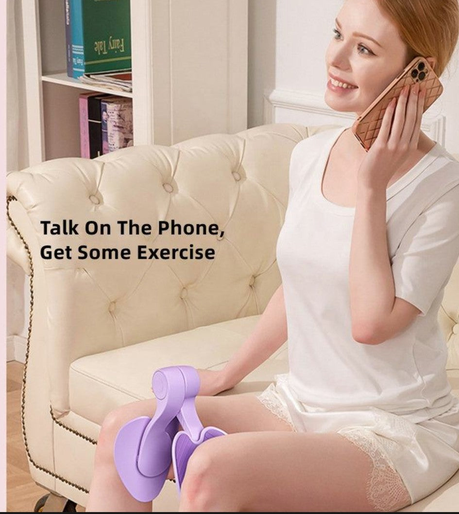 Lavender pelvic floor muscle trainer held between a seated woman's knees