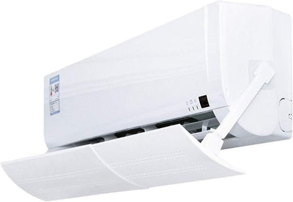 White adjustable air conditioner shield mounted below a wall unit, with curved deflector panel.