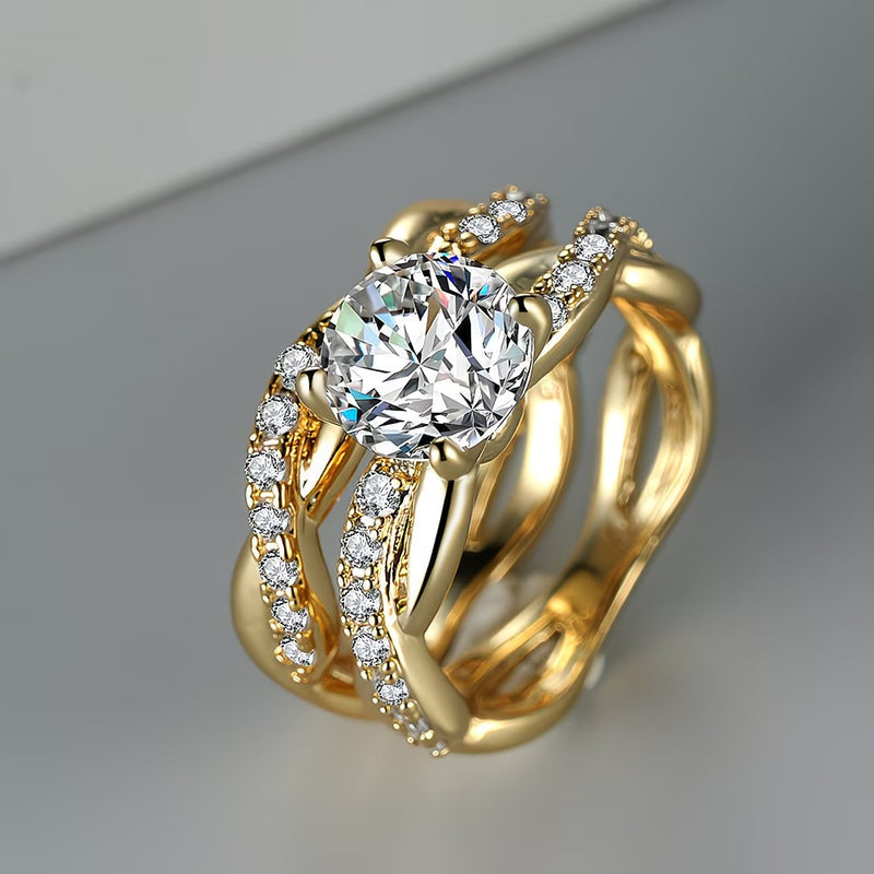 Gold women's ring with round zircon and pavé crystal accents